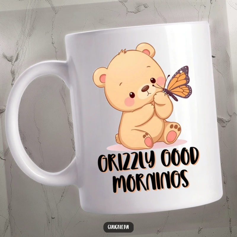 Funny mug featuring an adorable bear cub playfully tickling a butterfly with its large paw, showcasing gentle mischief and wonder.
