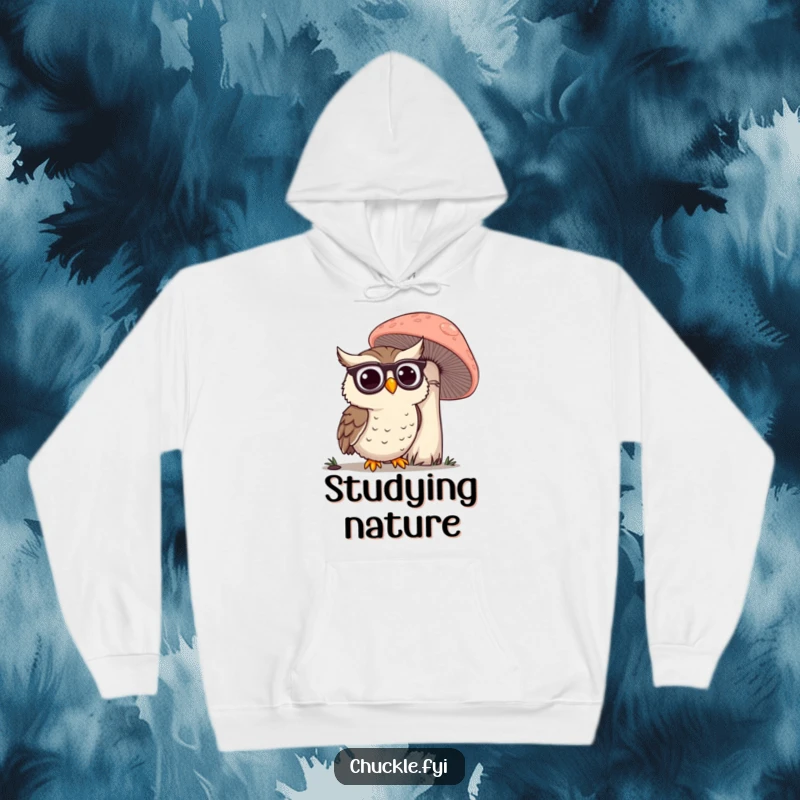 Funny Owl Hoodie: A happy owl wearing spectacles, curiously observing a giant mushroom, offering cozy wisdom.