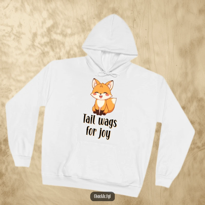 Soft and warm hoodie showcasing a funny giggling fox with its tail wagging in pure delight.