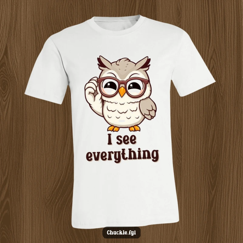 Funny owl t-shirt featuring a wise, chuckling cartoon character adjusting its spectacles with a knowing grin, exuding intelligence and humor.