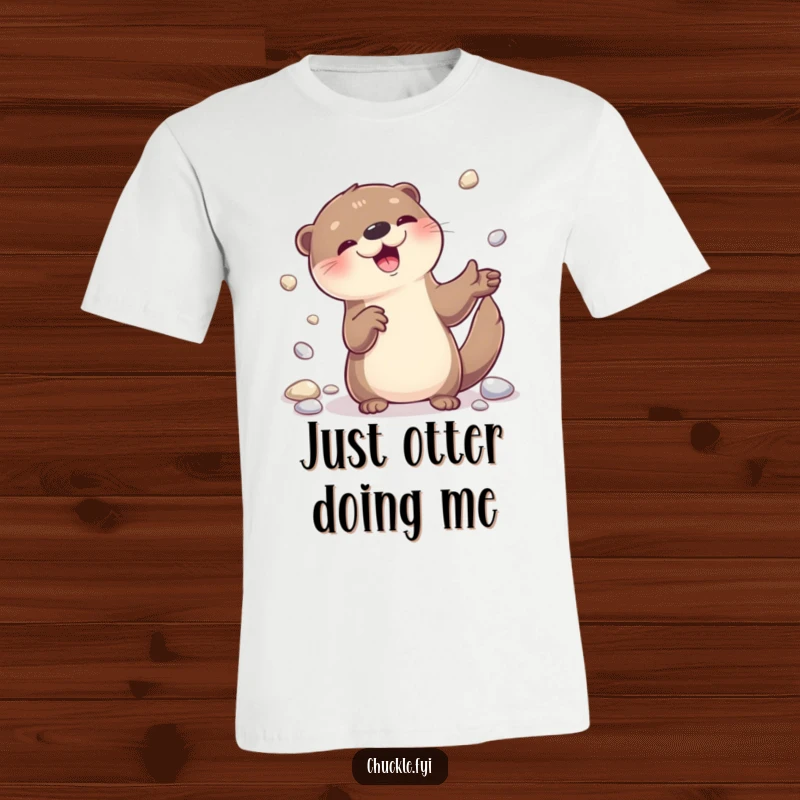 Funny playful otter character juggling shiny pebbles with a wide, delighted expression on a t-shirt.